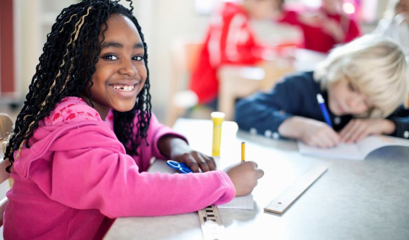 Foto: NTB scanpix Credit: Oslo kommune Barn skriver.